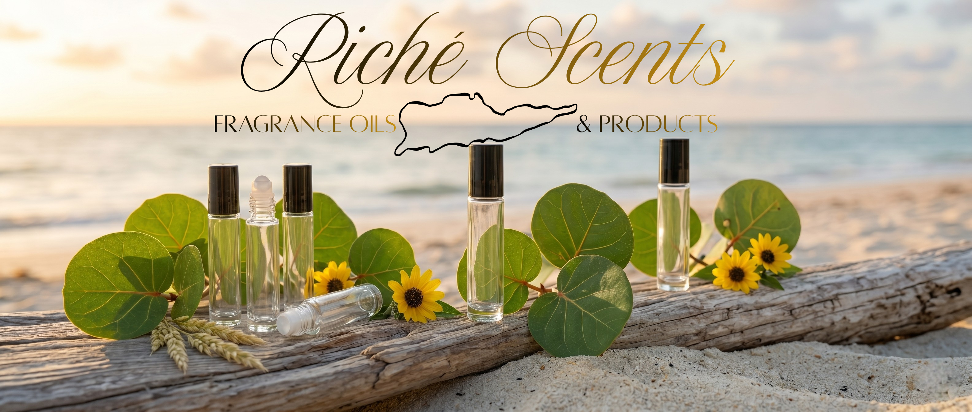 Riché Scents fragrance oils on a beach with ocean view